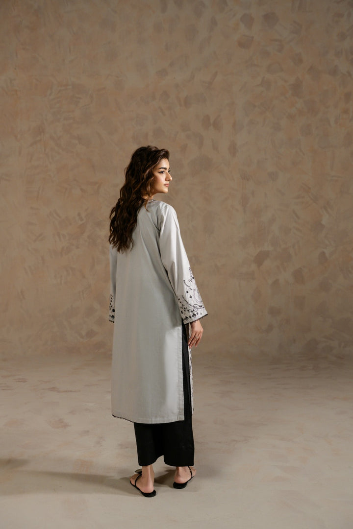 Lightweight embroidered cambric shirt for casual wear by Zehnaz