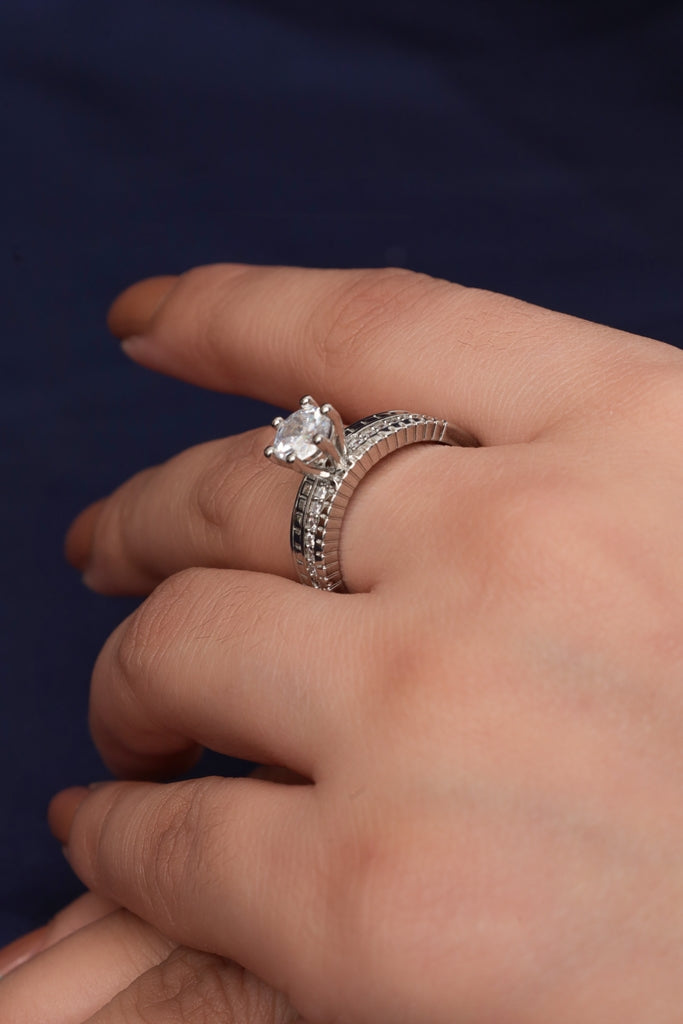 white gold pave engagement ring with center stone