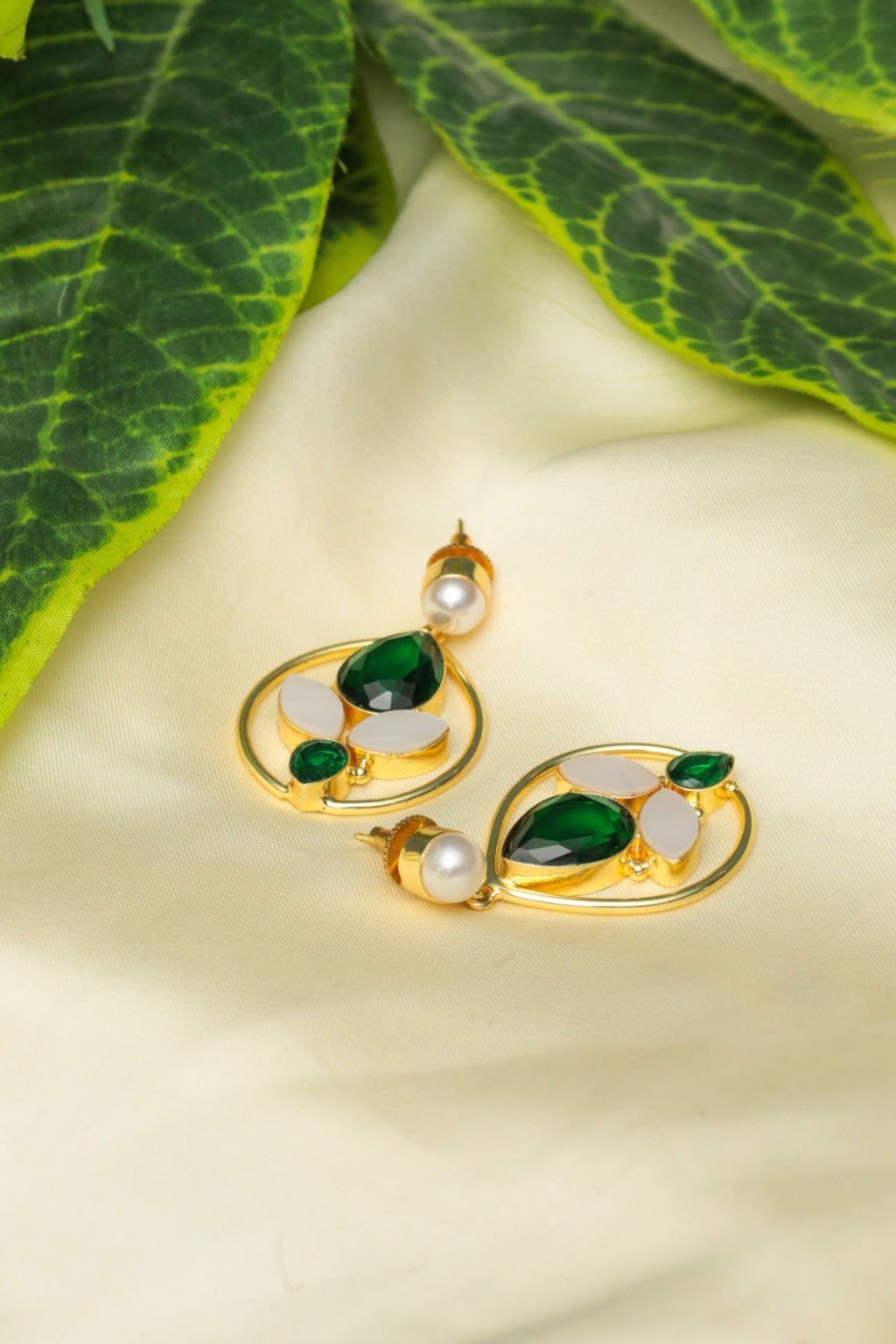 Gold earrings with green and pearl accents