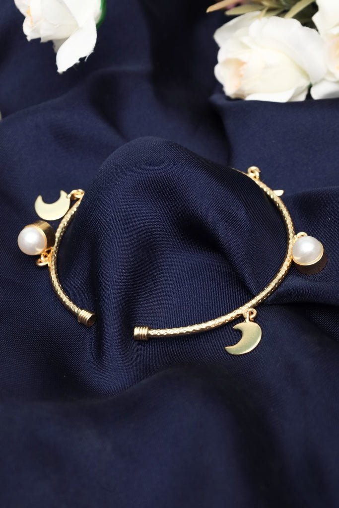 Gold Tone Crescent Moon and Pearl Open Cuff Bracelet - Zehnaz.ae