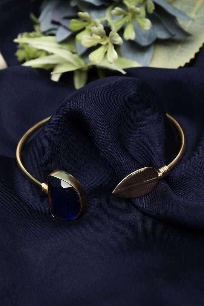 Gold - Tone Open Cuff Bracelet with Blue Stone & Leaf Motif – Nature - Inspired Statement - Zehnaz.ae