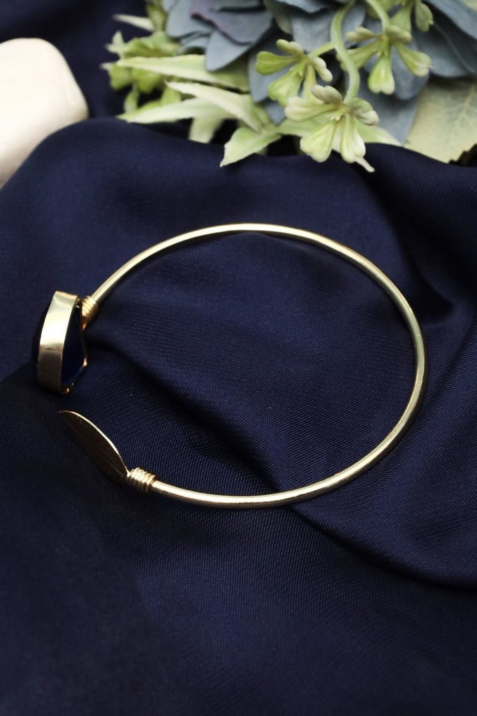 Gold - Tone Open Cuff Bracelet with Blue Stone & Leaf Motif – Nature - Inspired Statement - Zehnaz.ae